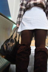 Girl at the escalator. images